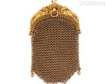 an image of a gold chain purse on a white background