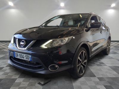 the black nissan qx sport is parked in the garage