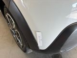 a close up of a car ' s bumper with a sticker on it