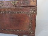 a small wooden box that is sitting on a table