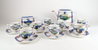 un ensemble de tasses et de soucoupes posées sur une table blanche