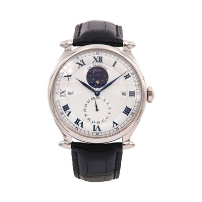 a close up of a watch on a white background with roman numerals