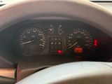 a close up of a car dashboard with a speedometer and gauges
