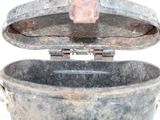 an old metal bucket with a handle and a lid