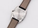 an image of a close up of a wrist watch on a white surface