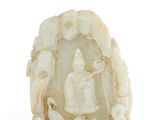 figurine en ivoire sculpté représentant un homme et une femme dans une grotte