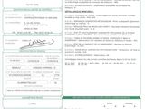 a green and white document with a picture of a person on it