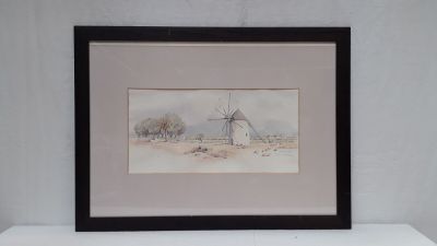 aquarelle encadrée représentant un moulin à vent par temps de neige