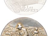 deux pièces d'argent sur lesquelles figurent un homme et une femme dans un champ