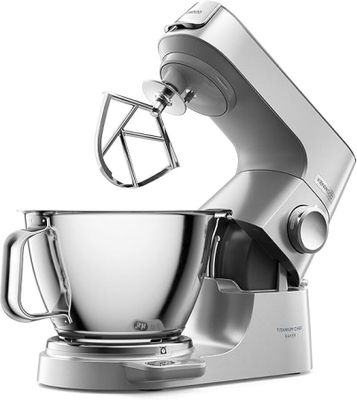 an image of a silver mixer with a metal bowl on top of it