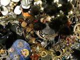 a pile of assorted jewelry on a table