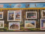 une photo d'une carte postale sur laquelle figurent de nombreux timbres