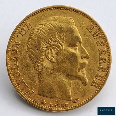 l'image d'une pièce d'or sur laquelle figure le visage d'un homme