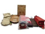 many bags of food that are sitting on a table