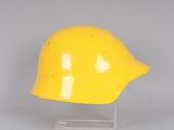 yellow helmet on a clear stand on a white background