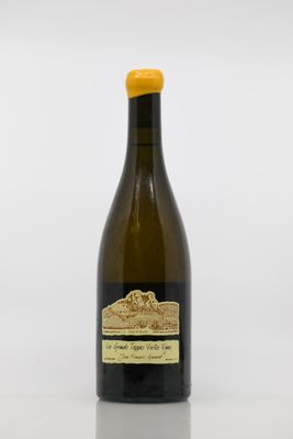 a bottle of wine that is sitting on a table