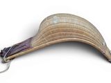 a wicker hat with an umbrella attached to it