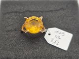 an image of a yellow ring with a price tag on it