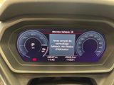 the dashboard of a car with a digital display on it