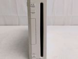 nintendo wii console in white box on white surface with white background