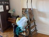 an image of a living room with a ladder and a chair