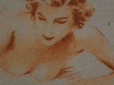 a drawing of a woman laying down on a bed
