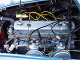 a small engine in the back of a blue car