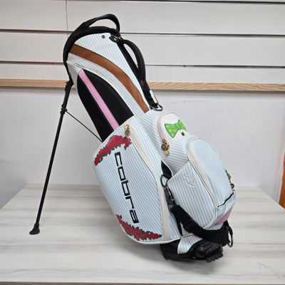 a golf bag that is sitting on a table