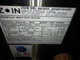 a close up of a sign on the side of a refrigerator