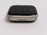 a close up of a smart phone on a white surface