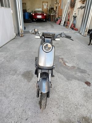 a motorcycle that is parked in a garage