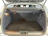 a trunk of a car with the back door open