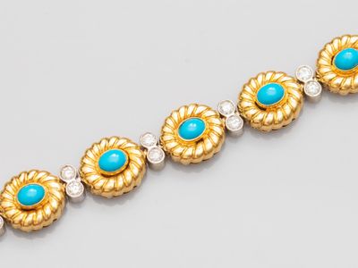 un bracelet en turquoise et diamants