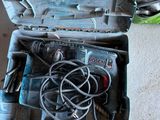 a tool box with tools inside of it on the floor