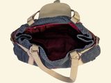 a bag that is sitting on a white surface