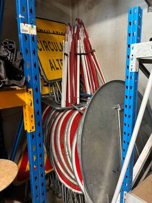 a rack with many different types of hoses on it