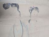a drawing of a woman and a child on a piece of paper