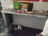 a table with a bunch of boxes on top of it