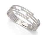 un bracelet rigide en or blanc 18 carats serti d'un diamant