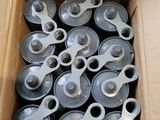 a cardboard box filled with lots of different types of scissors