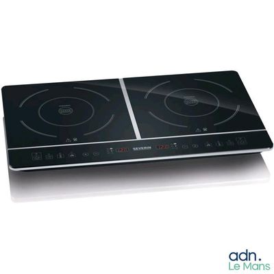 an image of a black electric cooktop with two burners