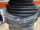 a stack of black hoses stacked on top of each other