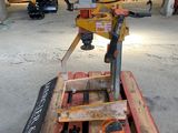 a machine that is sitting on a pallet in a warehouse