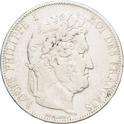 an image of a silver coin with a woman ' s head on it