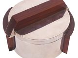 a silver box with a wooden handle on a white background