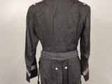 the back view of a black jacket on a mannequin mannequin