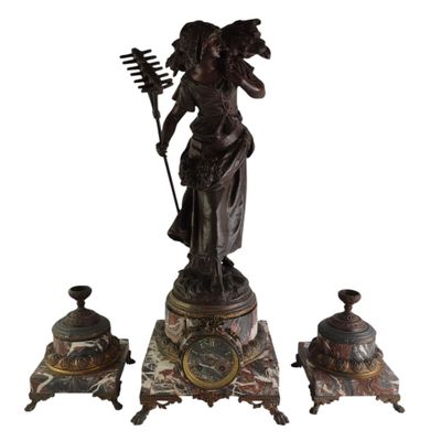 an image of a statue of a woman holding a broom and a clock
