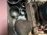 a box full of old items that are sitting on the floor