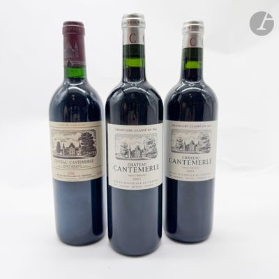 trois bouteilles de vin posées l'une à côté de l'autre sur une table