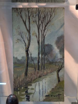 une image d'une peinture exposée dans une vitrine